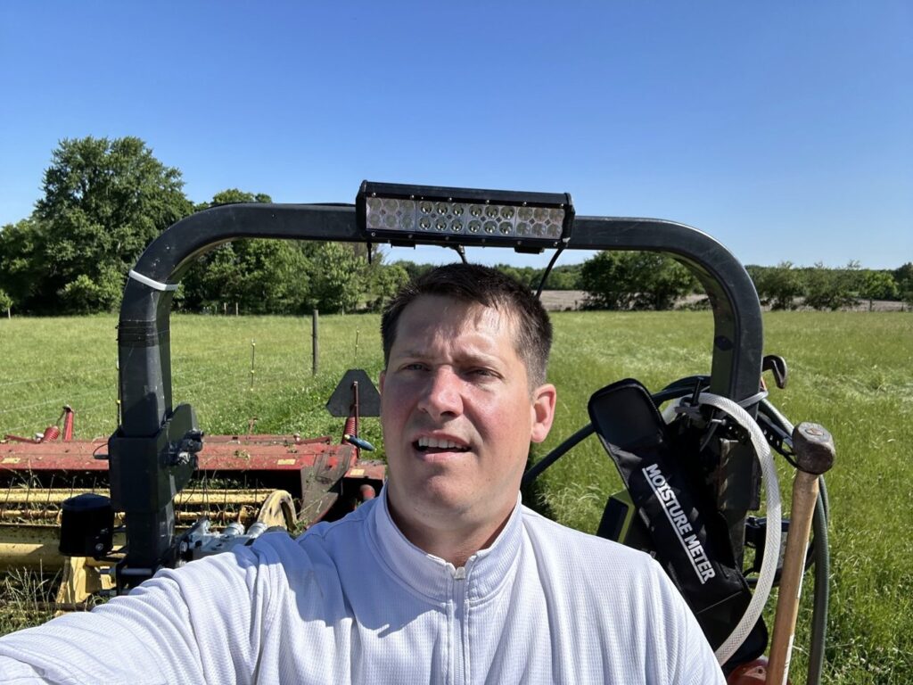 Phil on the tractor at the farm